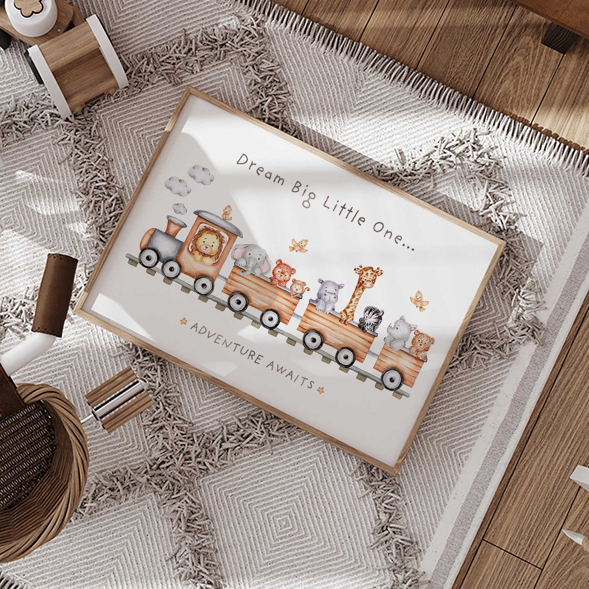 Adventure Awaits wall art with safari animals riding in wooden train cars for nursery decor