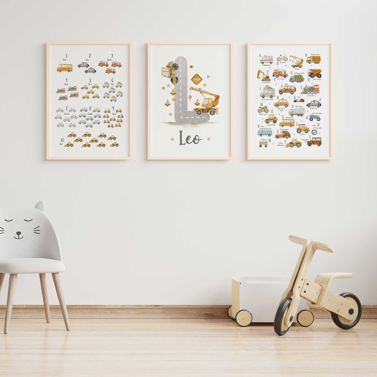 Alphabet and numbers wall art set with construction vehicles and personalised name print for a kids playroom