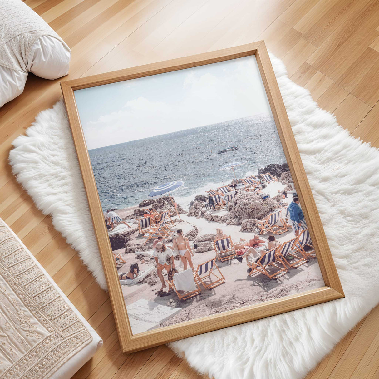 Stylish Amalfi Coast inspired print with loungers and sunbathers by the sea