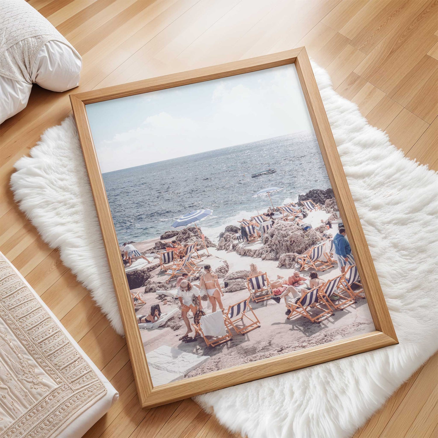 Stylish Amalfi Coast inspired print with loungers and sunbathers by the sea