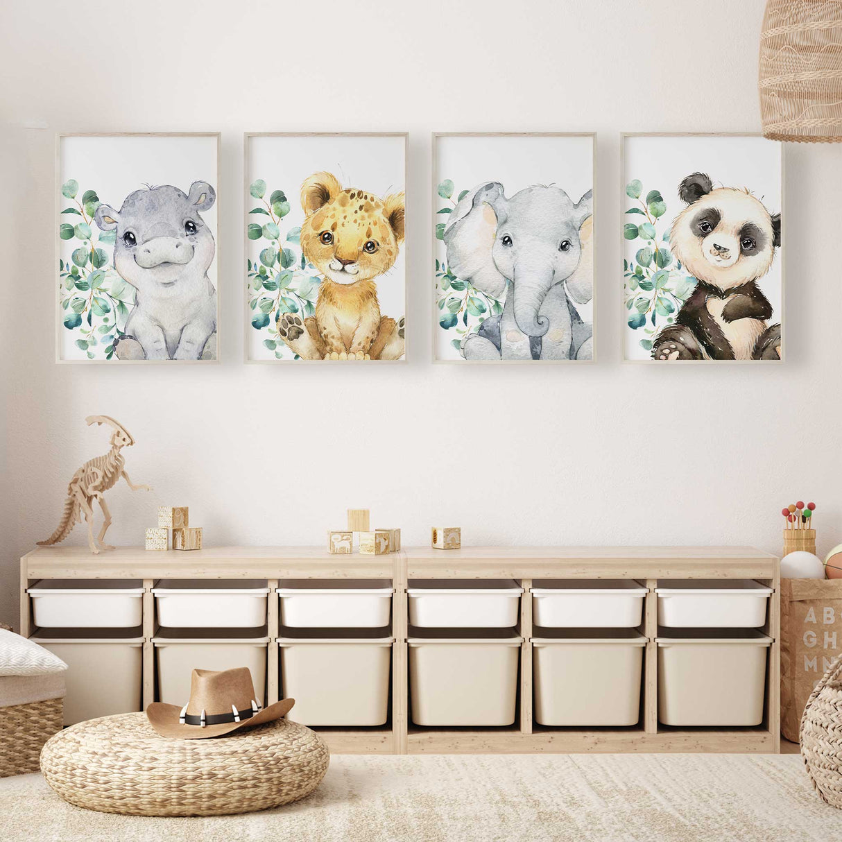 Baby animal nursery wall art prints featuring soft safari animals and eucalyptus leaves