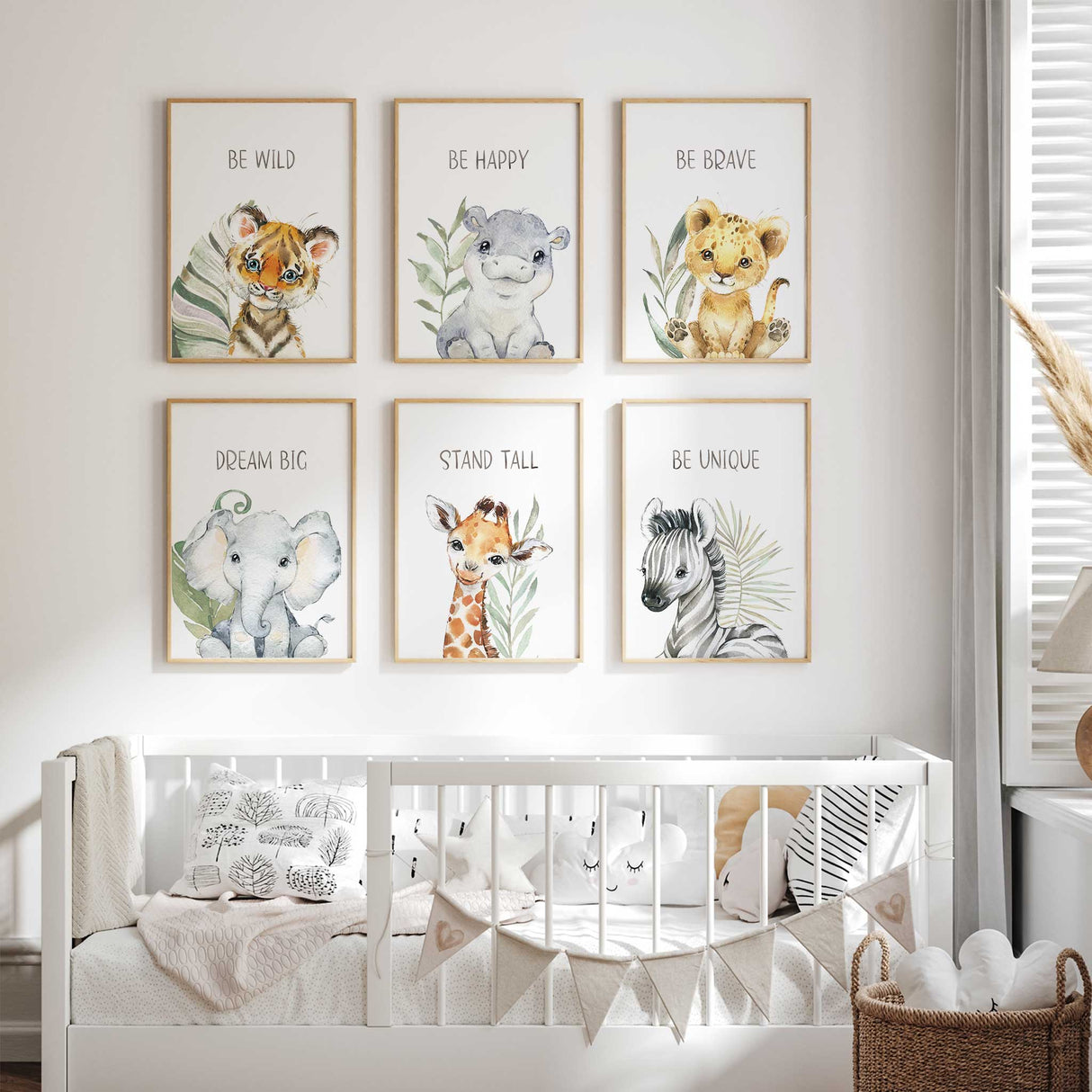 Baby animal nursery wall art prints with soft illustrations perfect for safari-themed nursery decor.