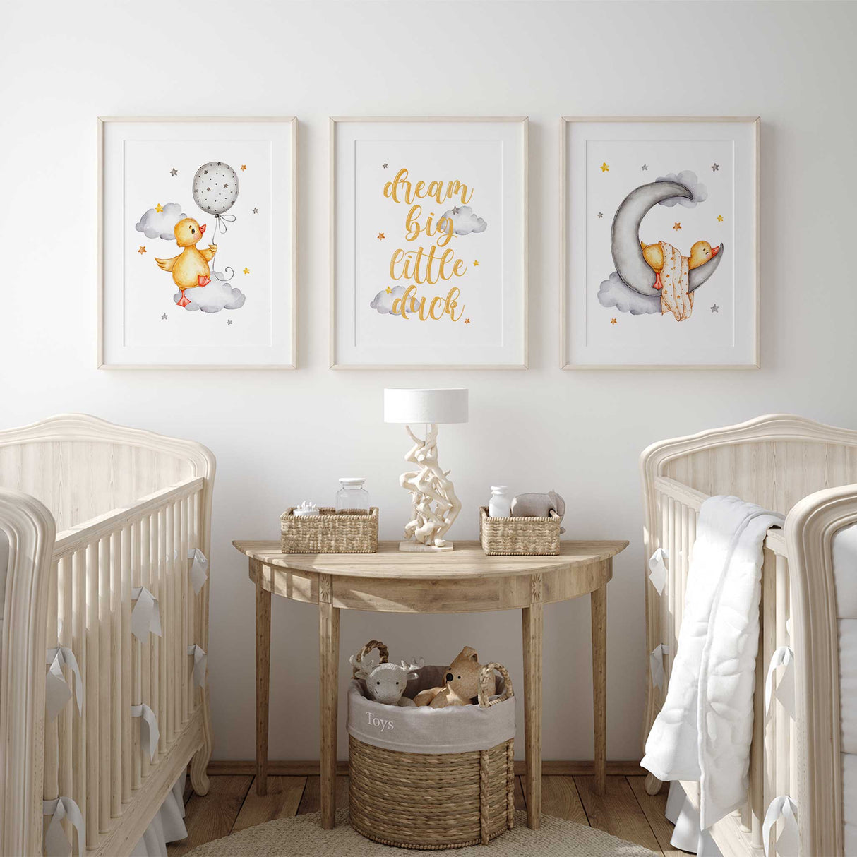 Baby duck nursery wall art print set in soft yellow and grey tones with clouds and stars, designed to create a calm and sweet atmosphere in a child’s room.