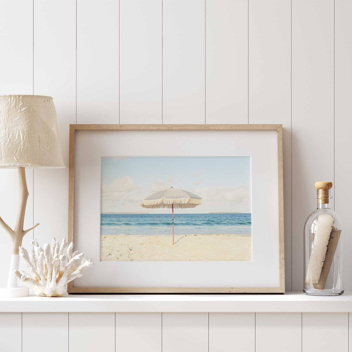 Minimalist beach print for bedroom or bathroom decor, featuring soft sand and sky tones.
