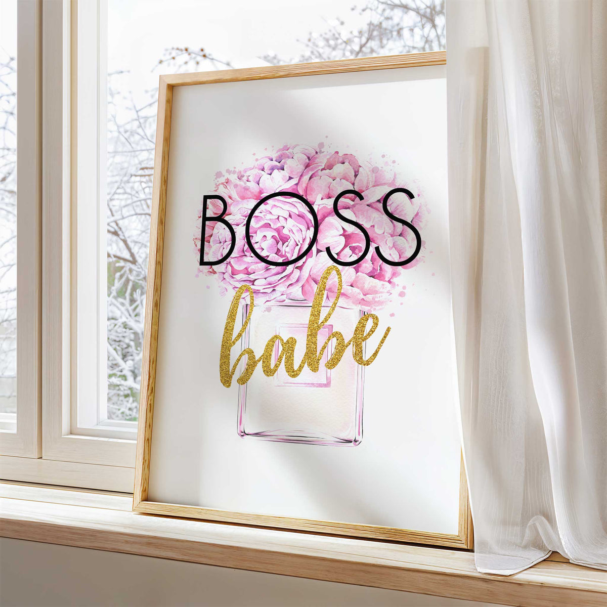 Perfume-inspired wall art showing an arrangement of pink peony flowers and the words Boss Babe with gold accents.