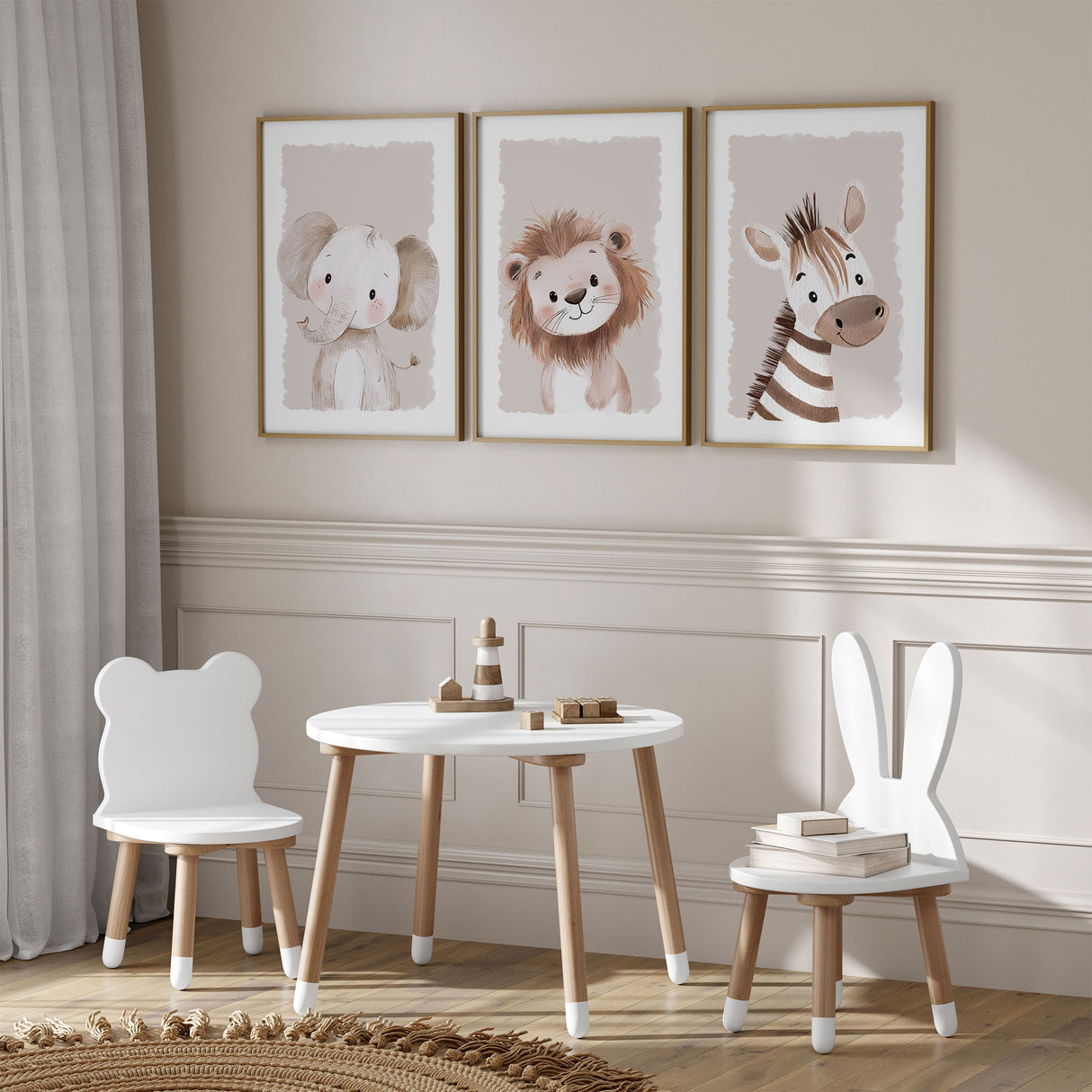 Beige safari nursery wall art set of three featuring a lion, zebra and elephant in soft neutral tones.