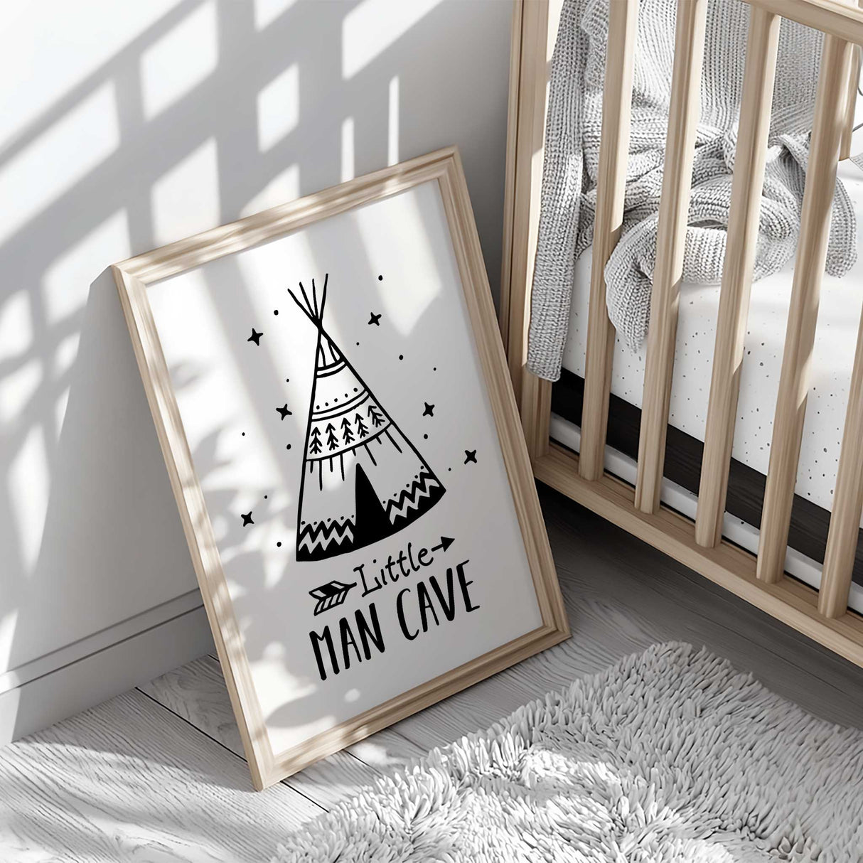 Bold black and white boys decor print reading Little Man Cave