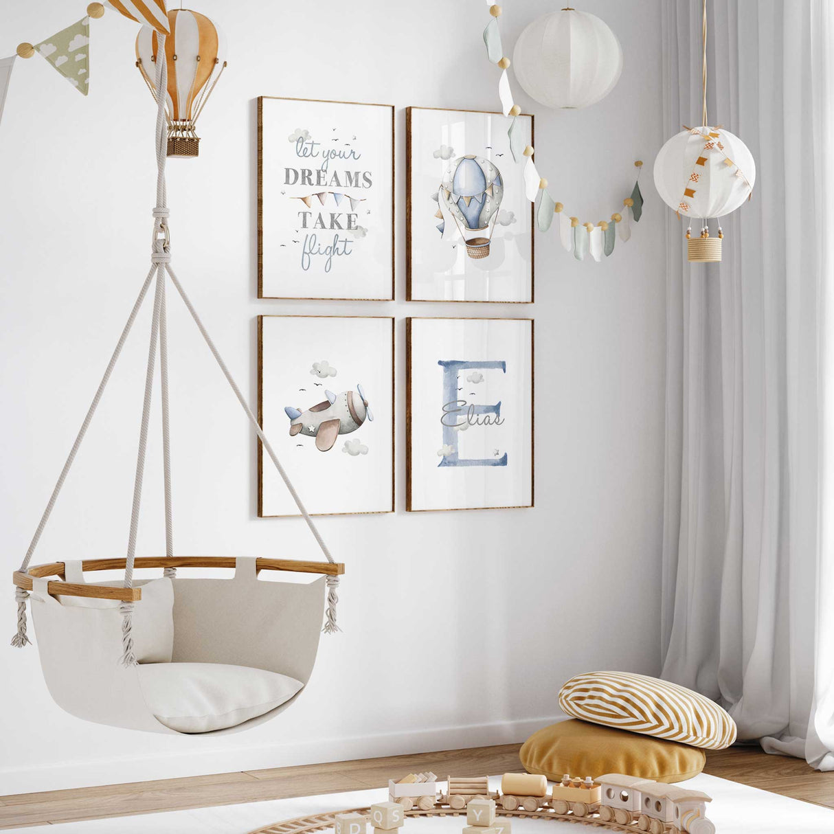Blue aviation wall art featuring a watercolour hot air balloon, personalised initial and aeroplane for a child’s room