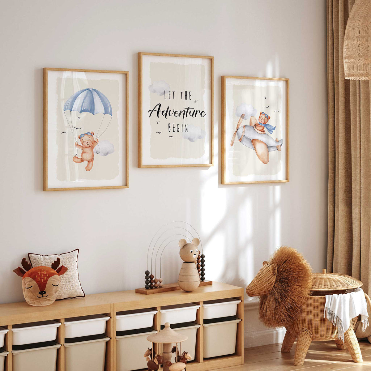 Blue teddy bear nursery print trio with a parachuting bear, a pilot bear and matching Let the Adventure Begin wording.