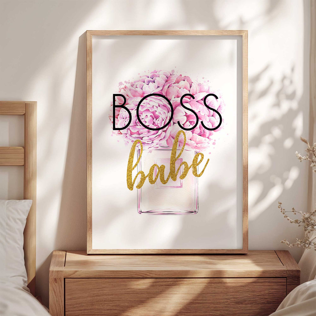 Decorative pink peony perfume print with large Boss Babe lettering and glitter-effect details in a feminine colour palette.