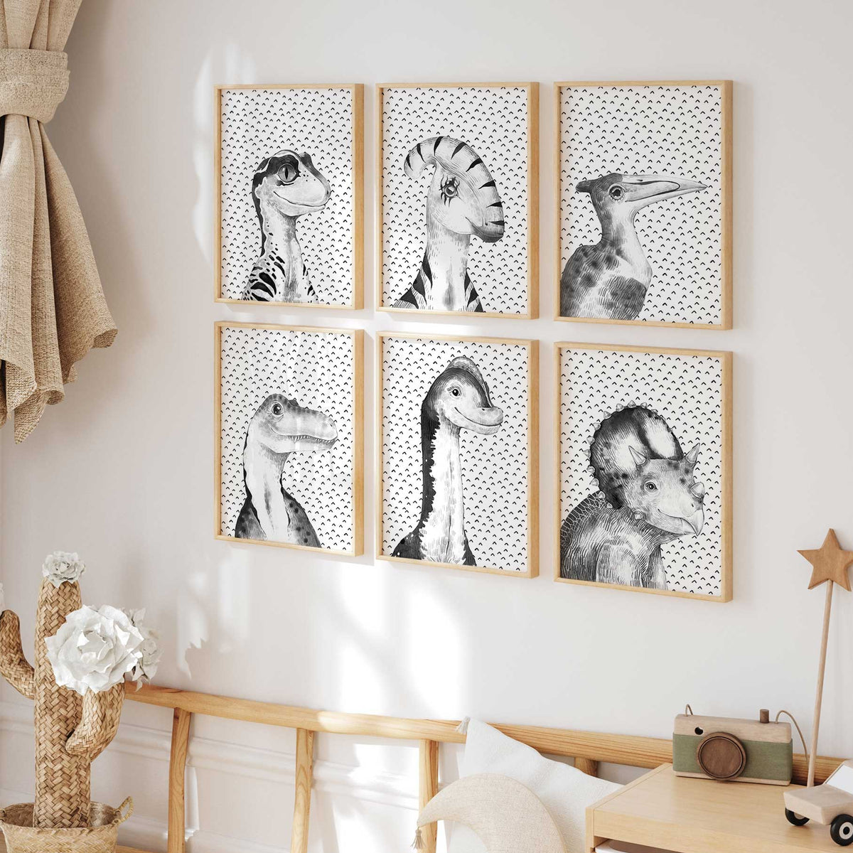 Black and white dinosaur wall art prints for kids bedroom or playroom gallery wall.
portrait style art set for boys room with Parasaurolophus, Triceratops, and more.