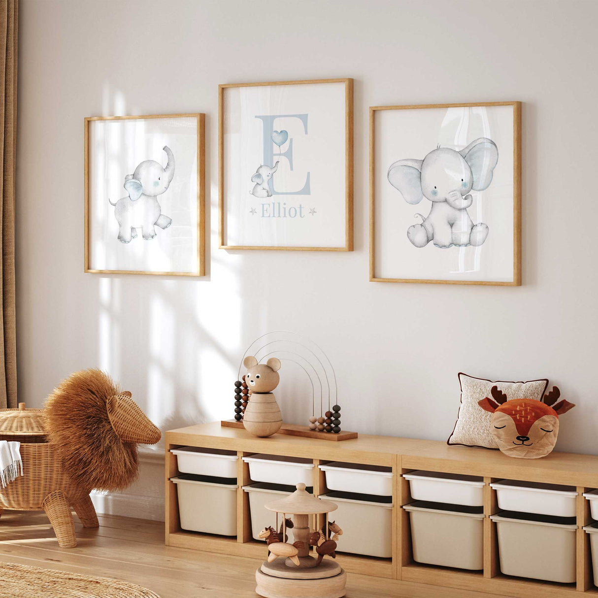 Set of 3 personalised blue elephant nursery prints featuring custom name and initial, perfect wall art for baby boys room or nursery décor.