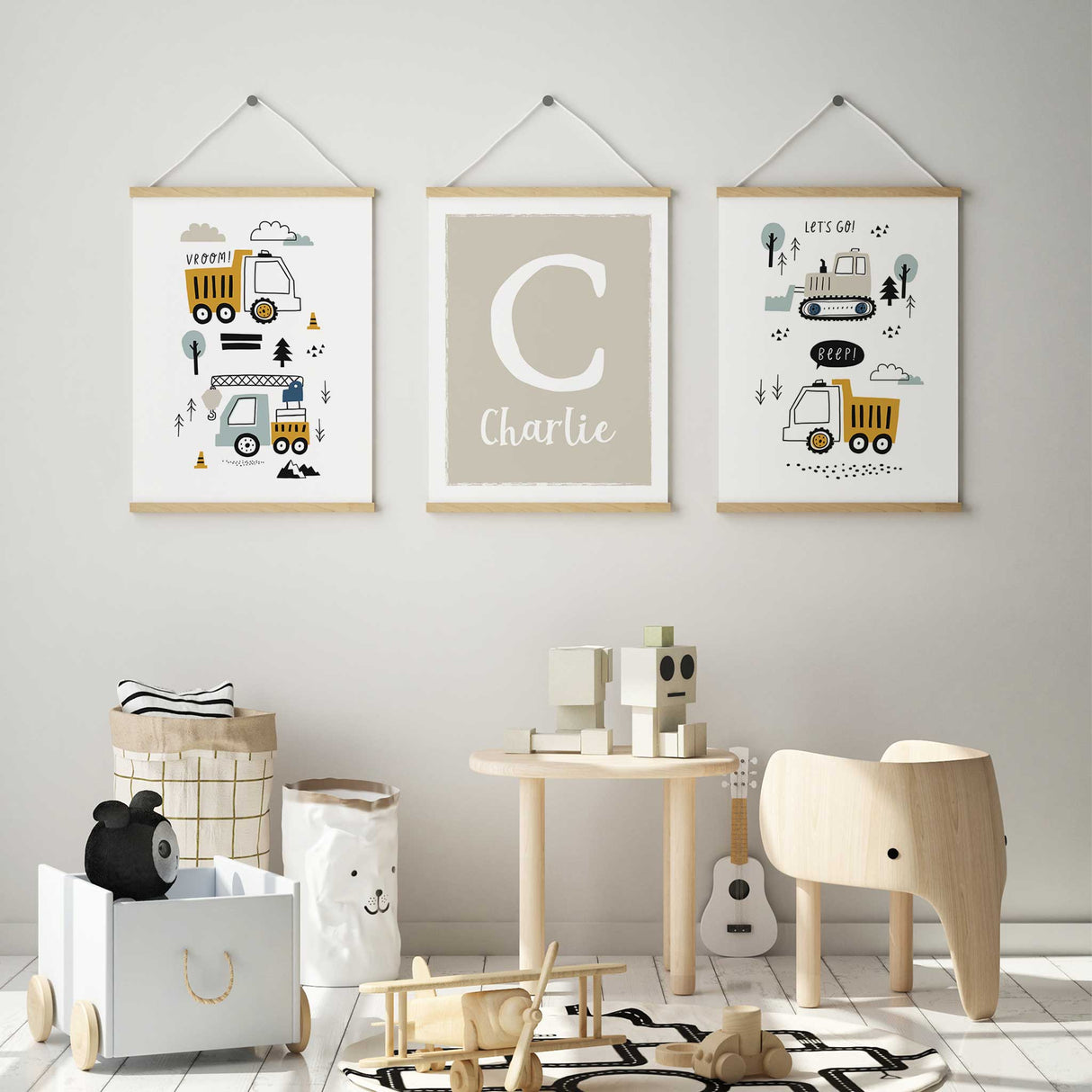Neutral colour personalised initial nursery art set with trucks and diggers for boys' bedrooms.