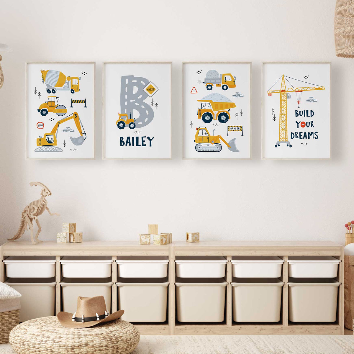 Four construction prints with yellow trucks and diggers, a Build Your Dreams crane and personalised road initial.