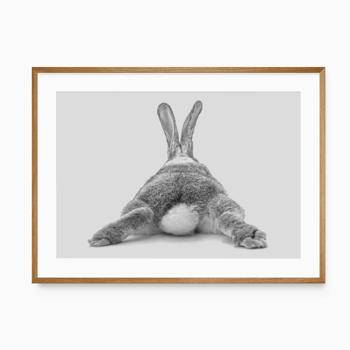 Bunny from behind kids wall art print in grey tones
