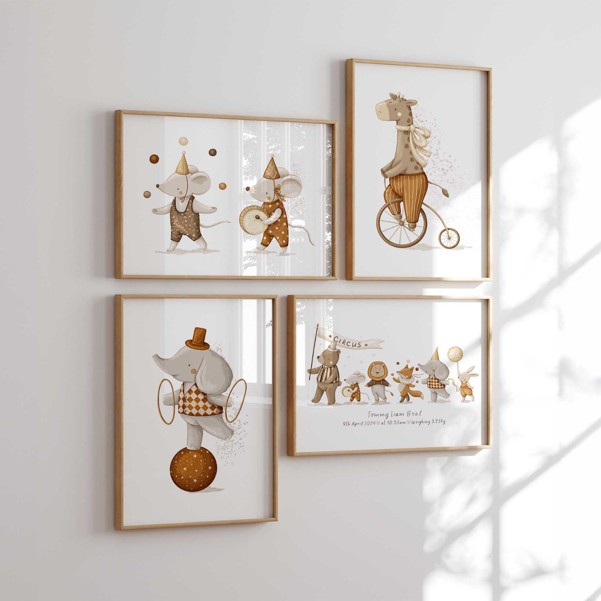 Neutral circus nursery wall art set of four prints with soft animal illustrations for modern nursery decor.