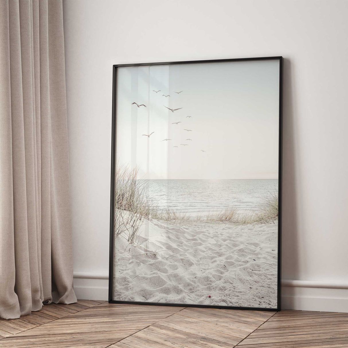Soft neutral coastal seascape wall print with ocean shoreline, beach grasses and peaceful sky for modern coastal interior styling