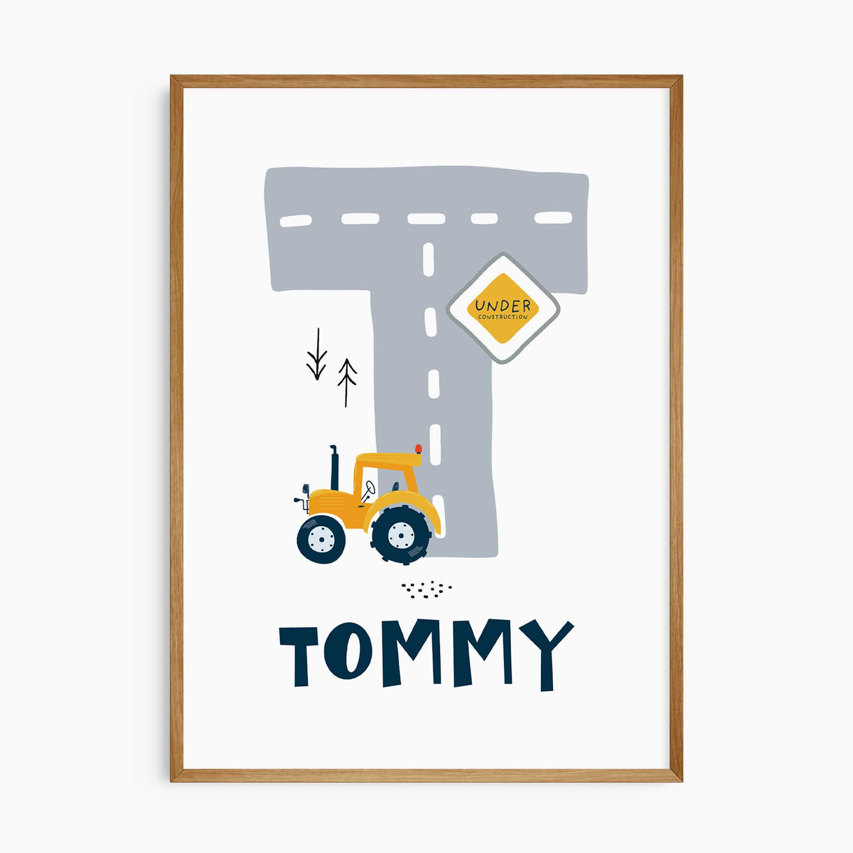 Personalised name print with a large grey road-shaped letter, yellow tractor and Under Construction sign on white.
