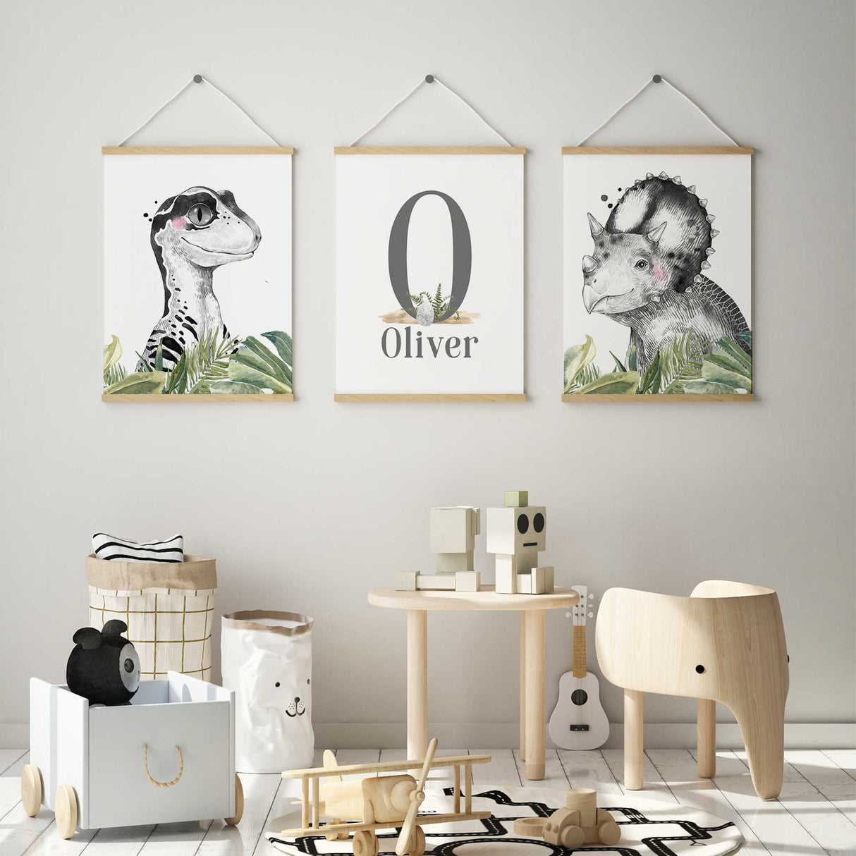 Custom boys dinosaur name wall art prints in monochrome with green leaves