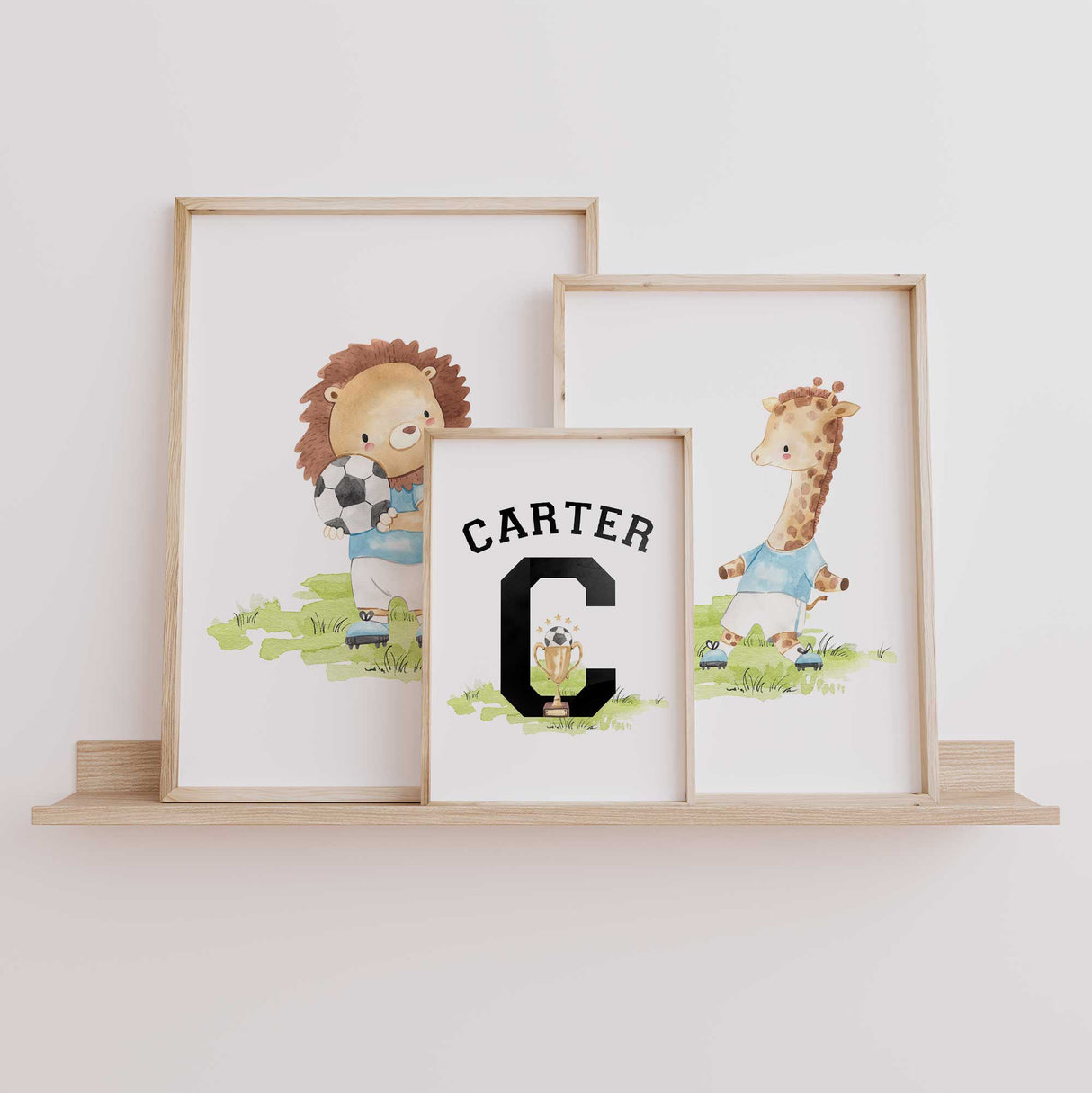 Customisable boys wall art with soccer animals and name print, perfect for sporty nursery or playroom decor