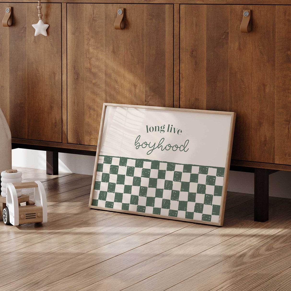 Modern playroom wall art featuring 'Long Live Boyhood' text.