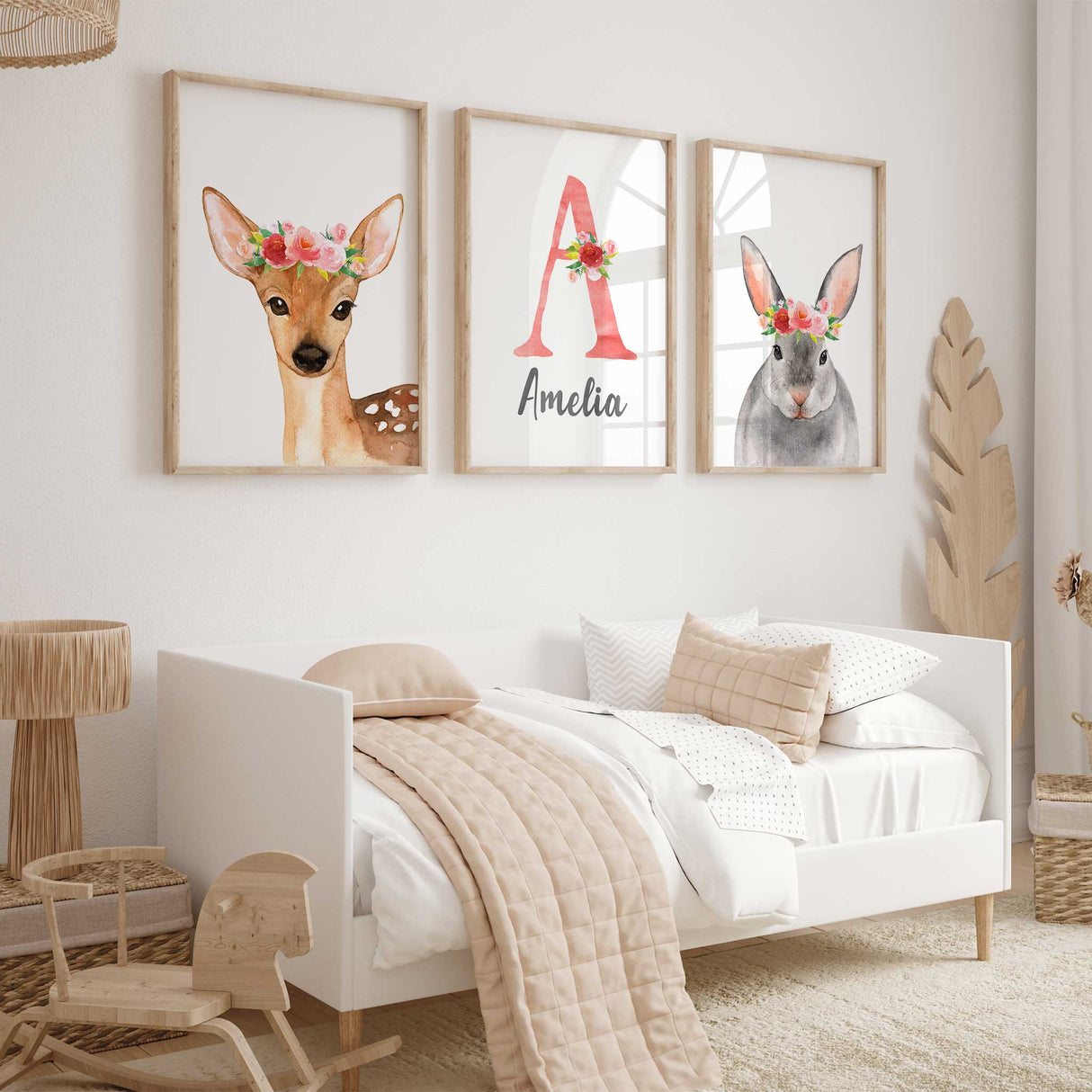 nursery art set featuring a deer, bunny, and personalized initial print.A beautiful set of three nursery wall art prints. Includes a watercolor deer with a floral crown, a personalized initial with name written beneath it, and a bunny with a floral crown. Perfect for girls bedrooms or nurseries