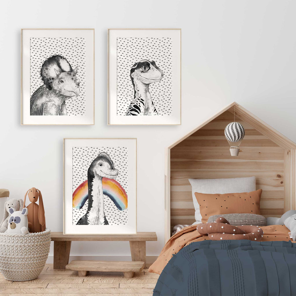 Dinosaur wall art trio in monochrome with rainbow for modern kids bedrooms