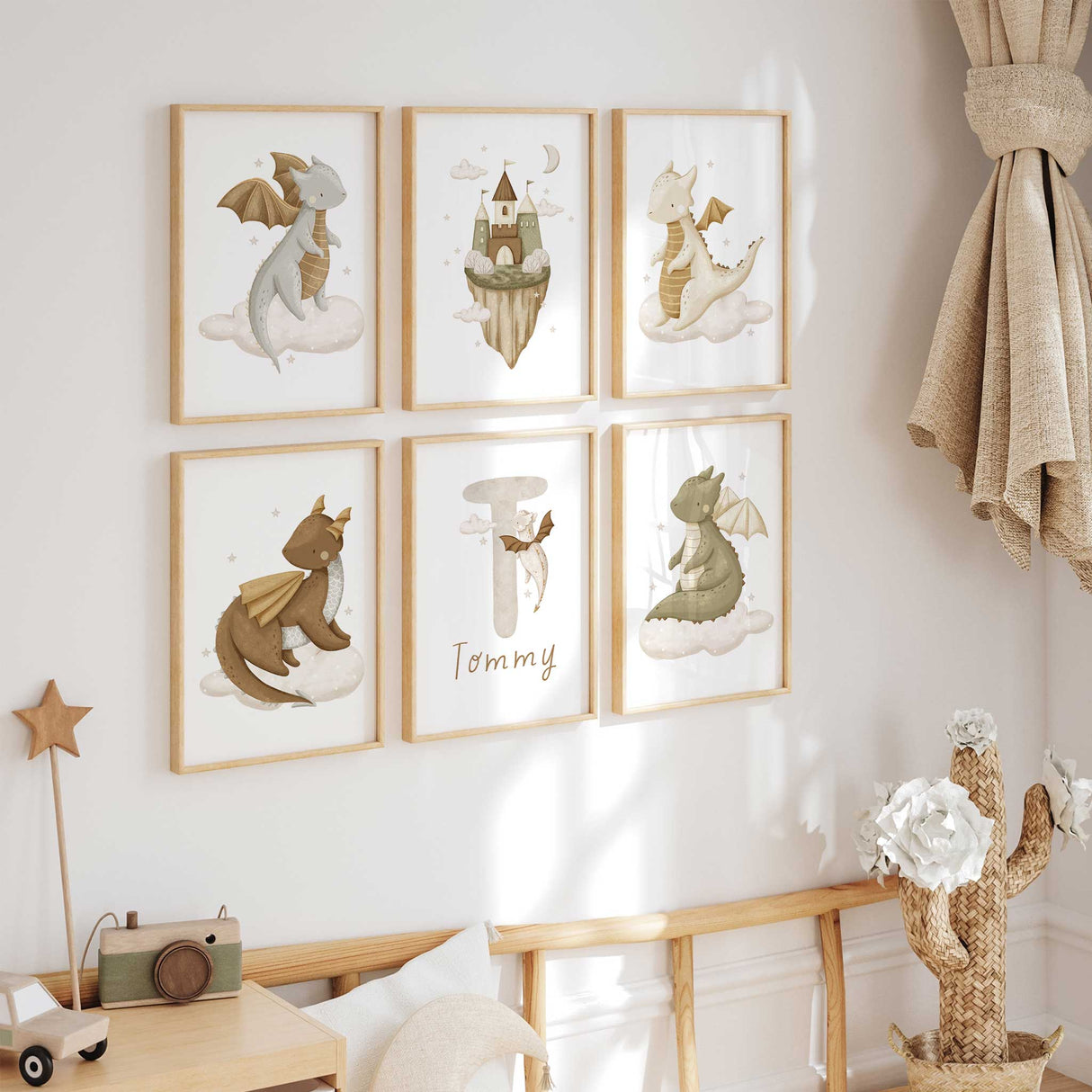 Dragon nursery wall art set featuring cute dragons and castle prints in earthy neutral tones