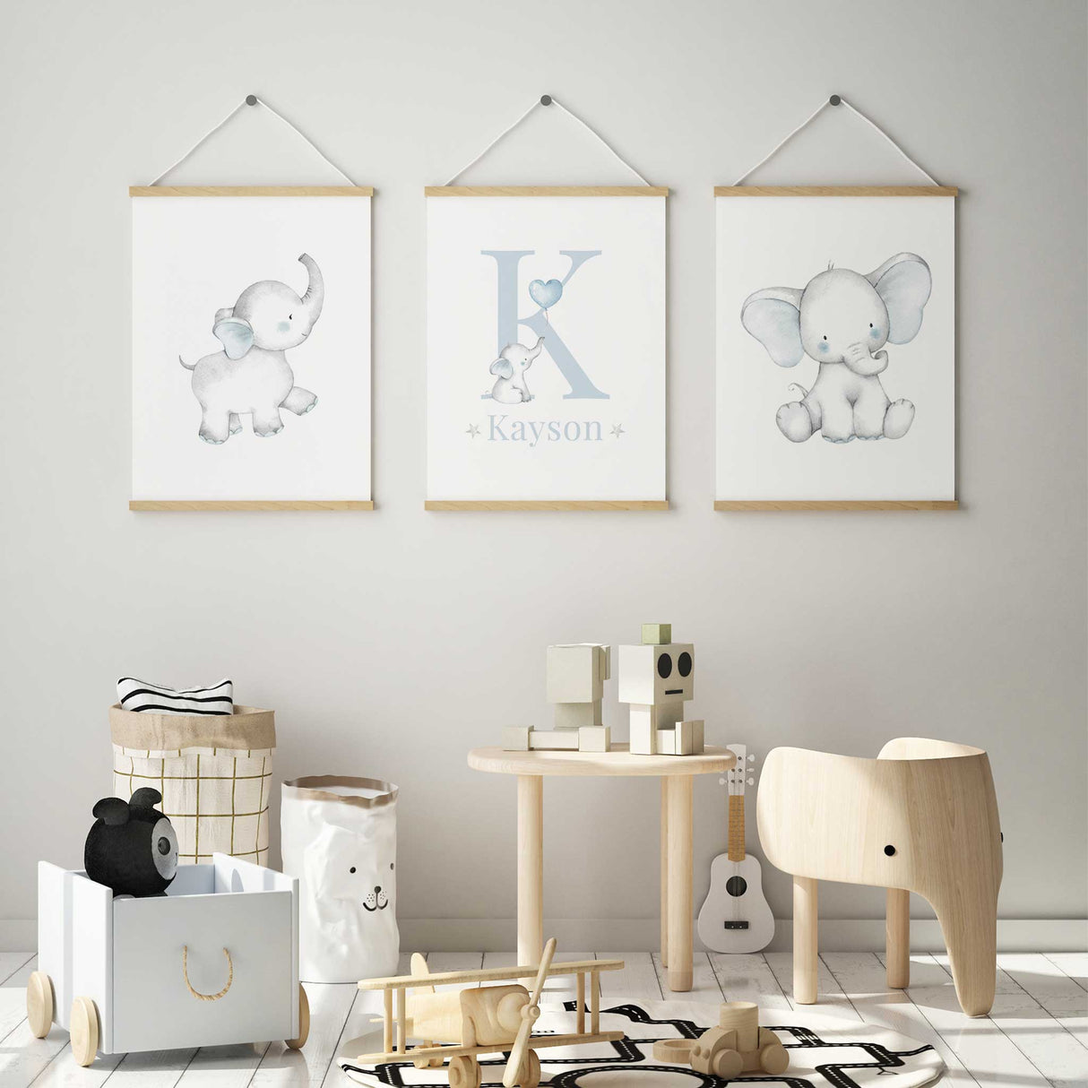 set of 3 blue and grey nursery wall art with the theme of elephants