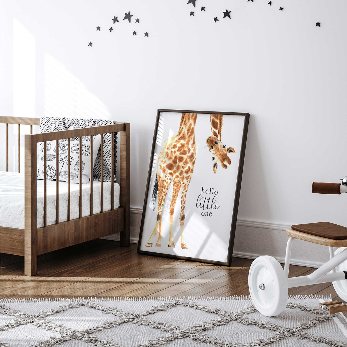 Gender neutral giraffe nursery wall art print with the phrase hello little one