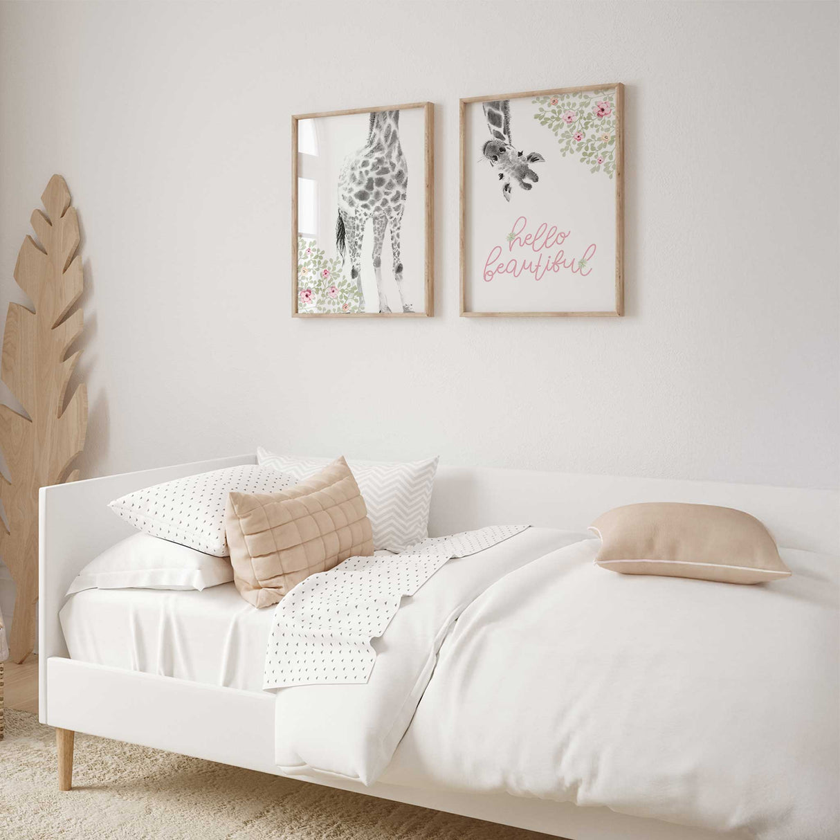 Close up detail of pastel florals and hello beautiful lettering from the giraffe girls nursery print.