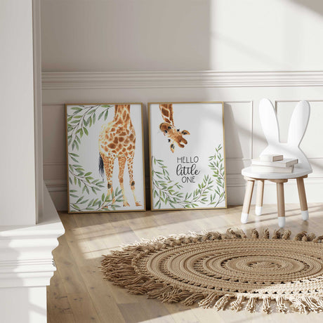 Giraffe nursery wall art set with “Hello Little One” quote and leaf border