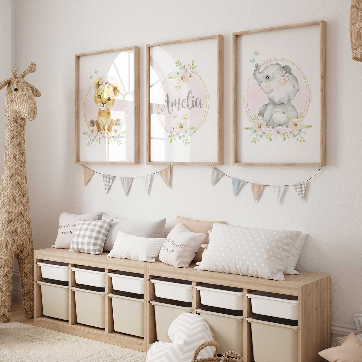 Girls safari nursery wall art set with lion cub, elephant, and soft floral details