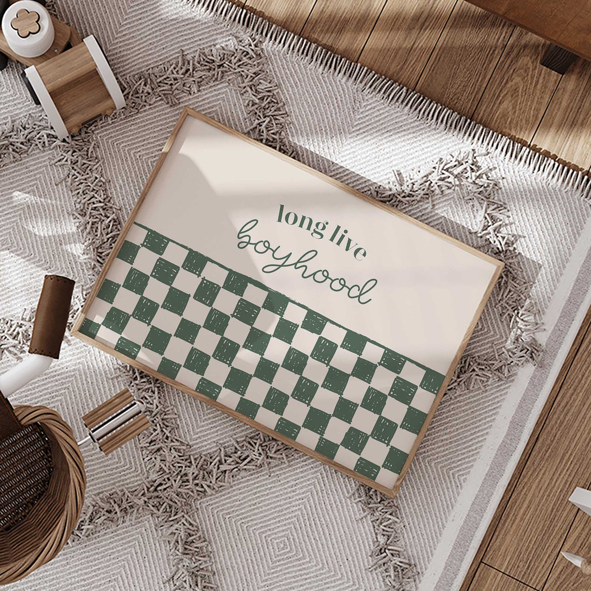 Minimalist nursery wall art with green checkerboard design and boyhood text