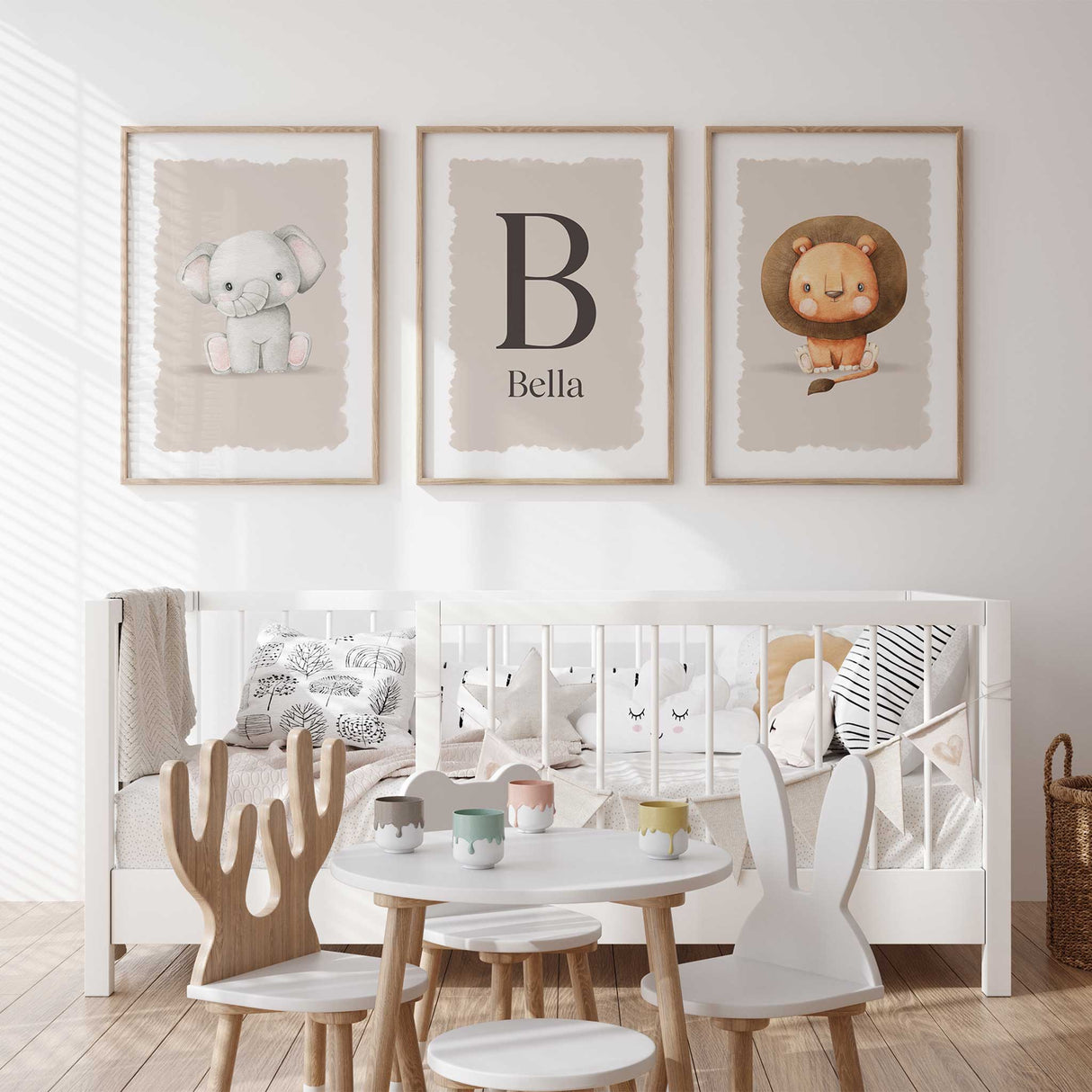 Safari animal wall art set with a cute lion, elephant, and name print, ideal for jungle or safari-themed nurseries