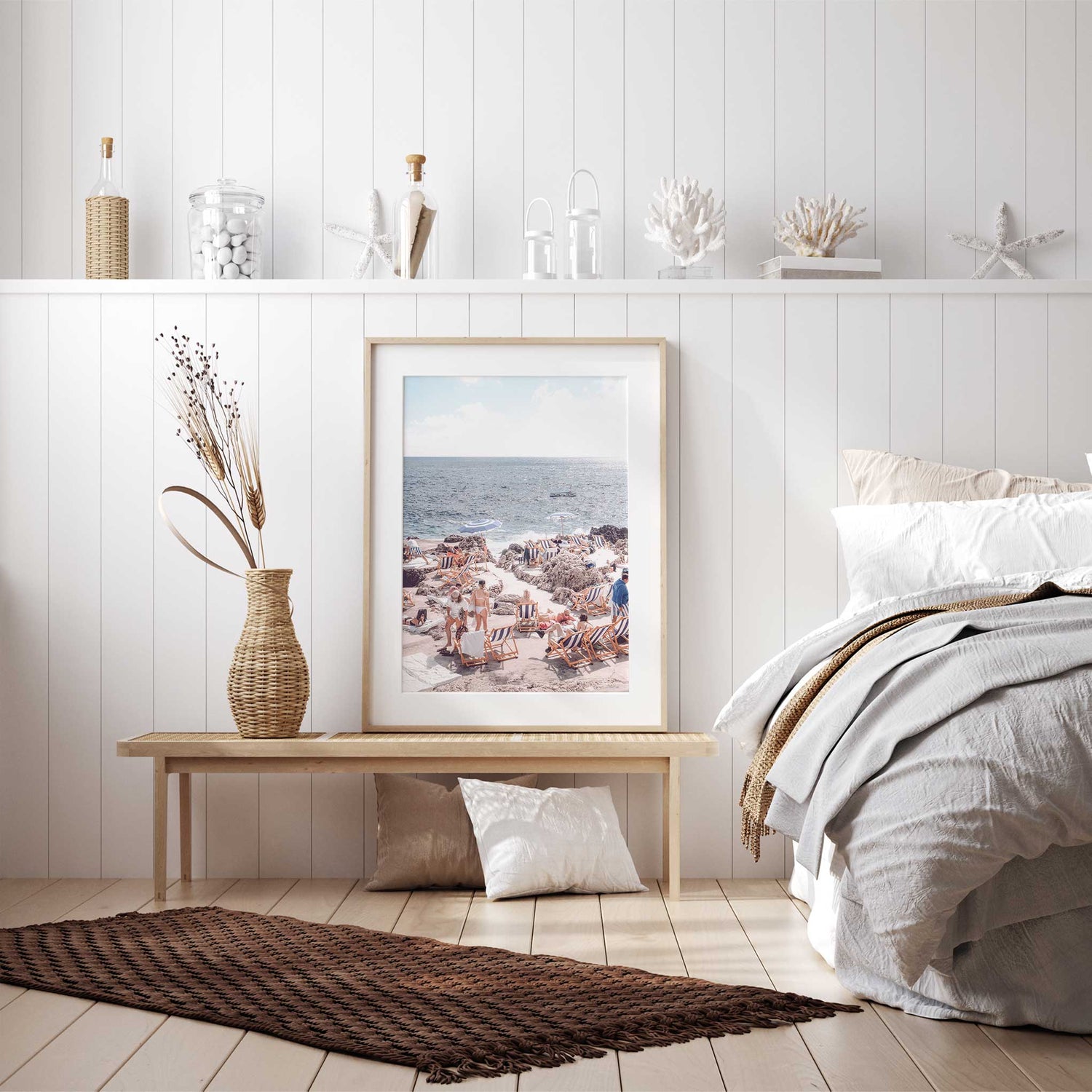 Italian seaside scene with people sunbathing on striped chairs near blue ocean