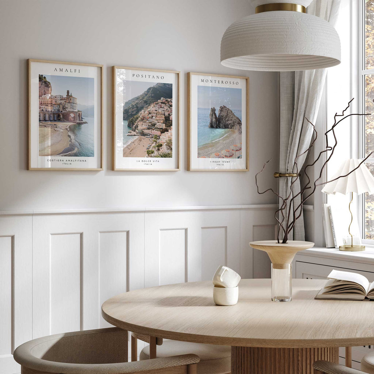 Three Italian coastal photography prints with Amalfi, Positano and Monterosso headings, blue sea and white borders.