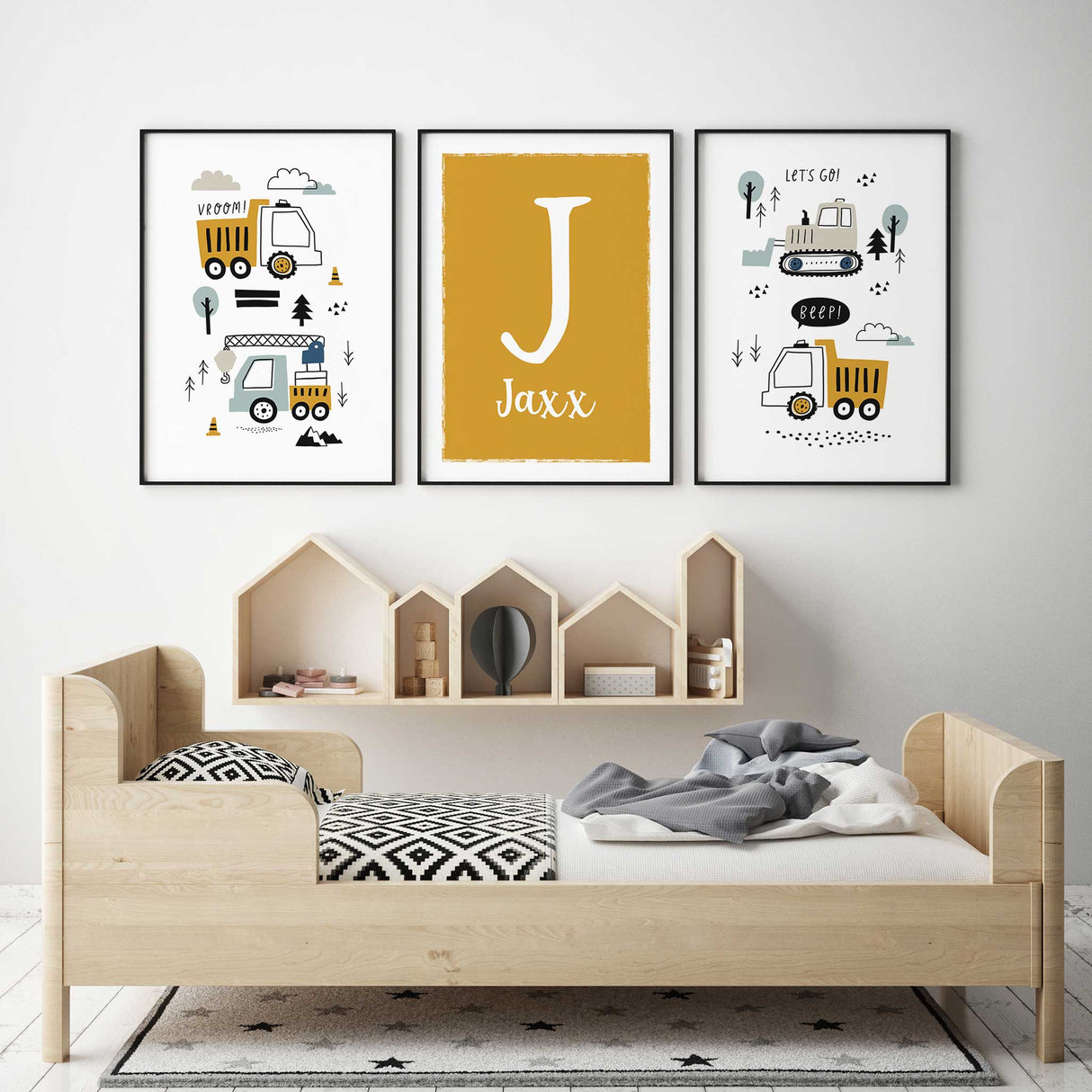 construction themed personalised nursery wall art with digger and truck prints for boys.