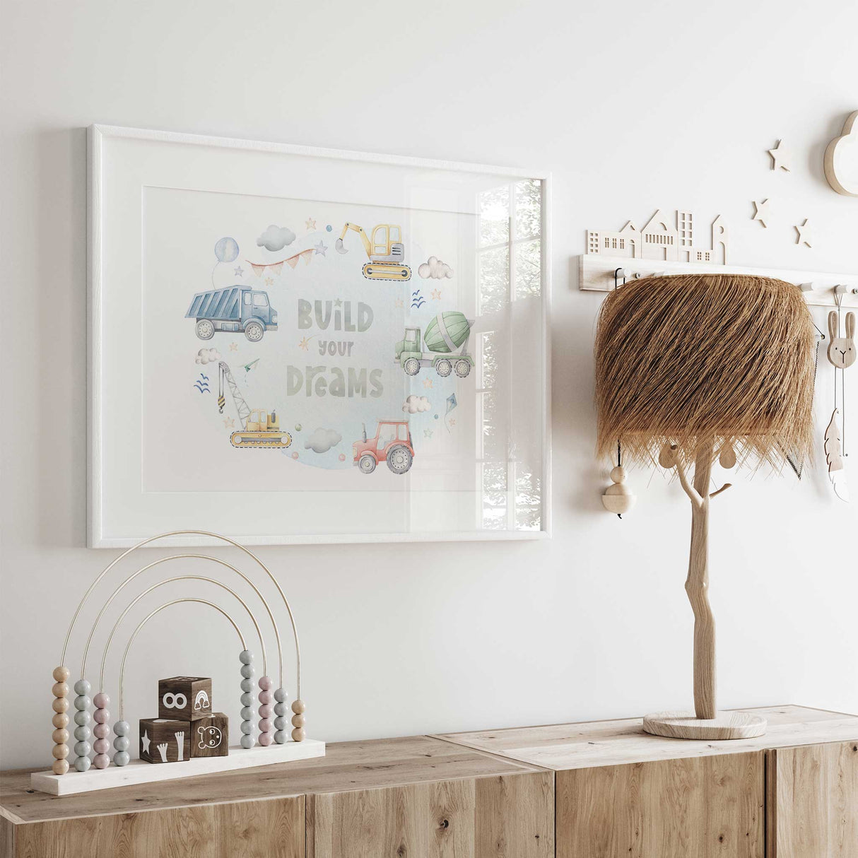Kids construction vehicle wall print featuring trucks and building vehicles with a positive Build Your Dreams message