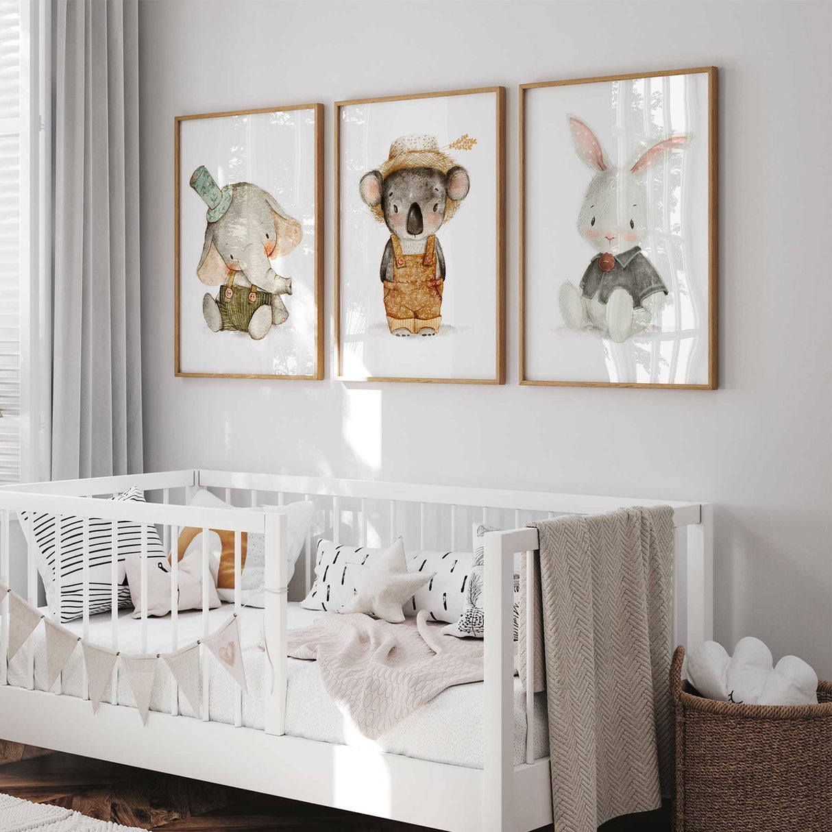 Kids’ room animal art prints featuring bunny, koala and elephant illustrations in soft neutral style.