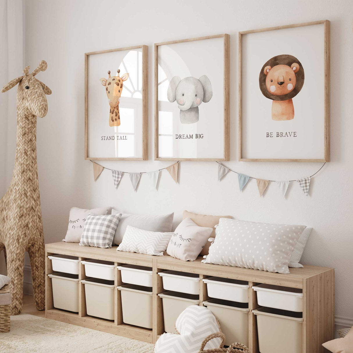 Set of three kids' safari wall art prints with lion, elephant, and giraffe for nursery decor.