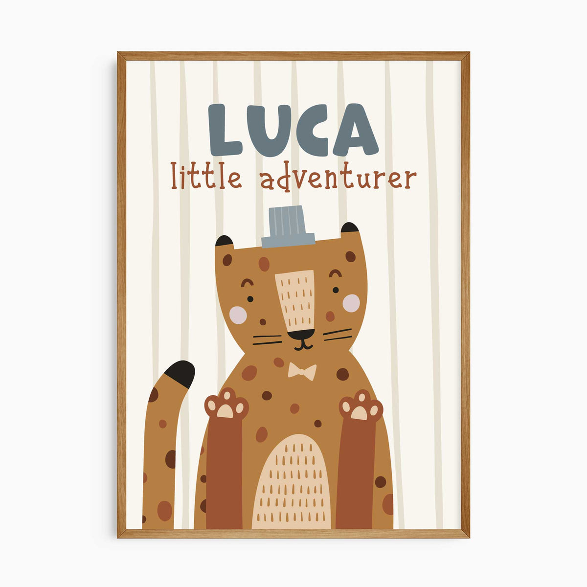 Personalised leopard print with a child’s name, party hat and little adventurer wording on a softly striped background.