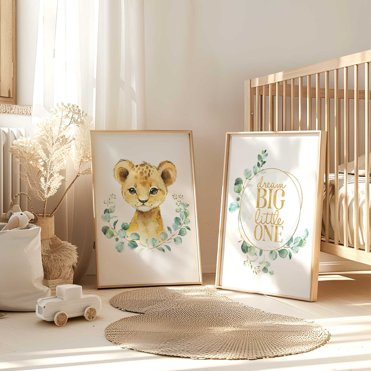 lion nursery wall art set with Dream Big Little One quote and eucalyptus greenery for baby room