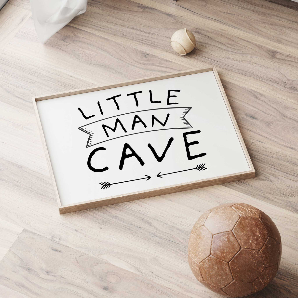 Little Man Cave wall art for kids playroom with bold lettering