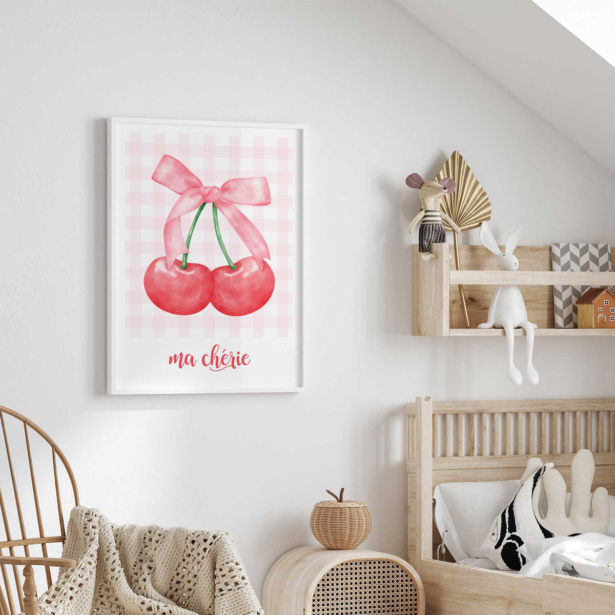 Ma chérie cherry print featuring a pink bow joining two red cherries above French text on a pale pink gingham background.