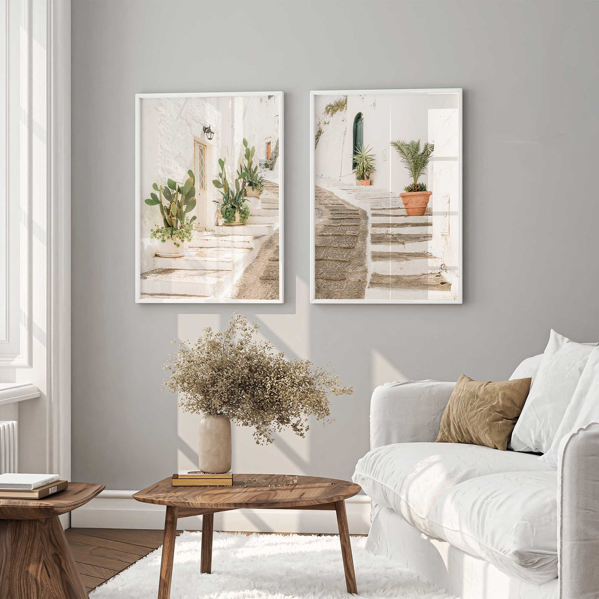 Mediterranean stone steps wall art print featuring whitewashed alleyway with potted plants and warm neutral coastal tones