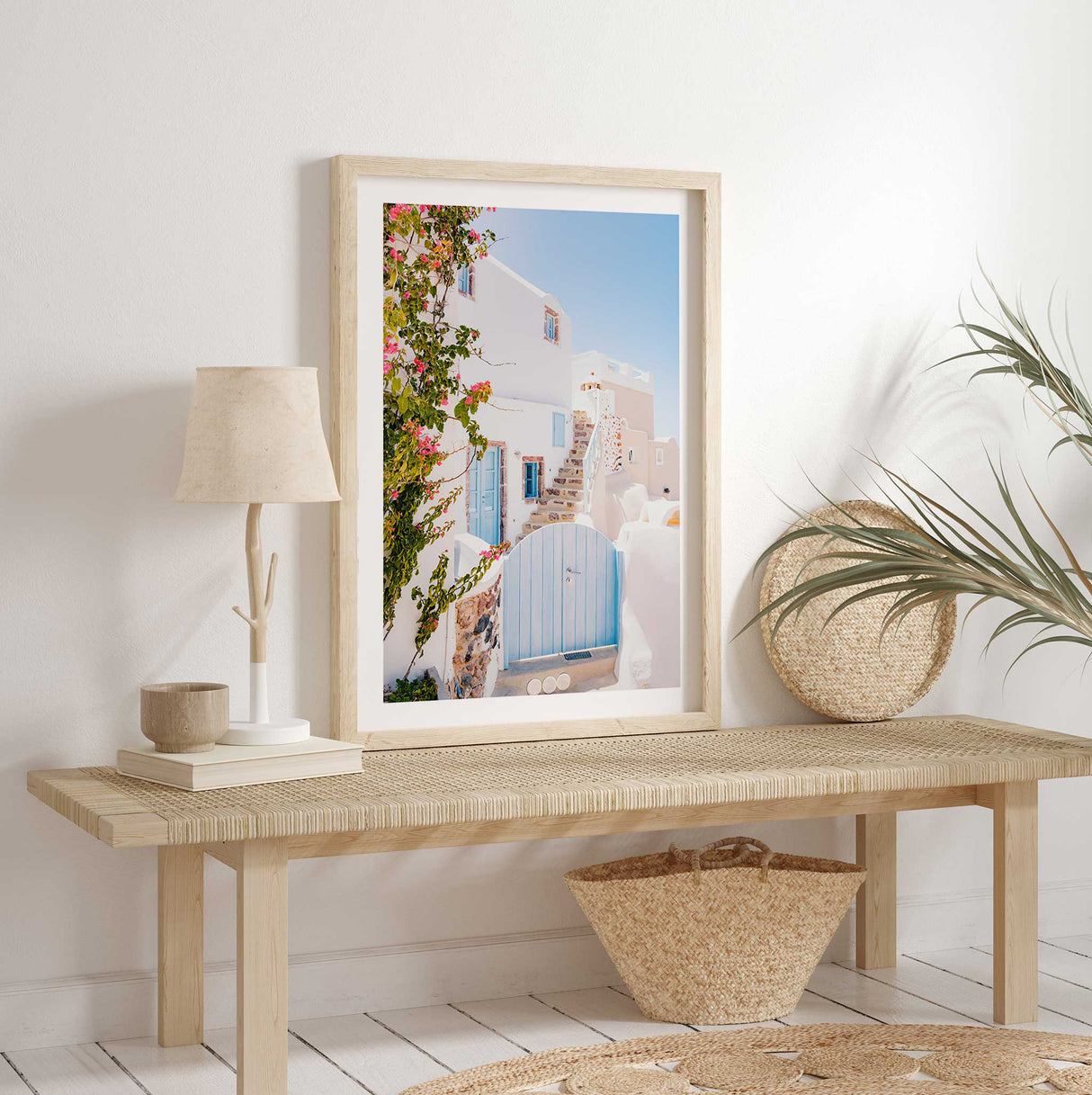 Greek island-inspired photography print featuring a coastal villa with stone stairs and a pastel blue door