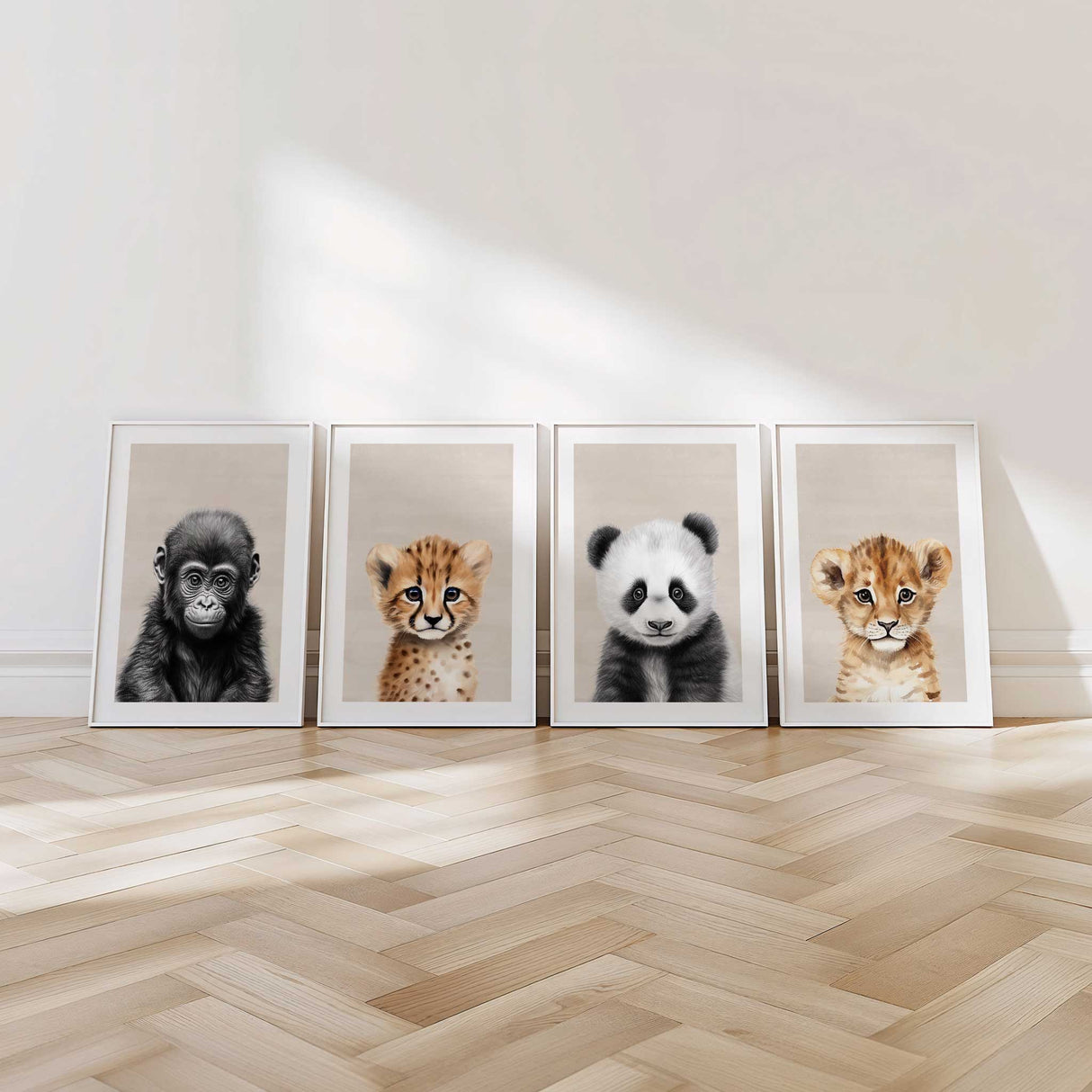 Modern safari animal nursery prints in neutral tones, featuring elephant, lion, zebra and giraffe baby portraits for gender neutral kids room decor.