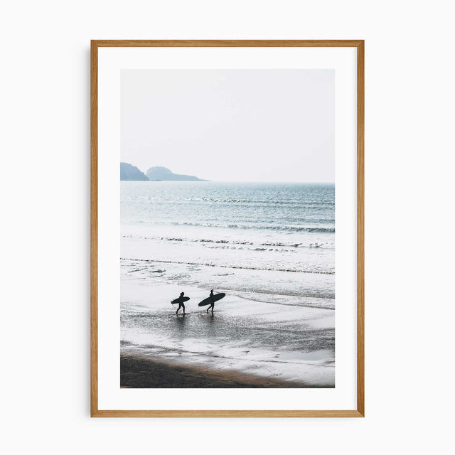 Morning surf art print with two surfers walking on a calm beach