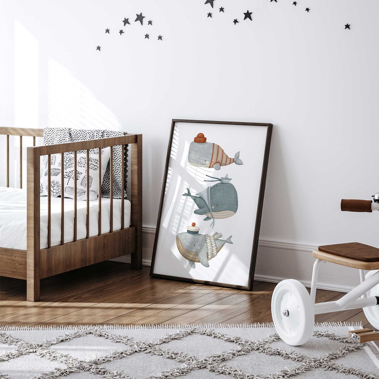 Coastal whale wall art set featuring three whales in sailor-inspired outfits